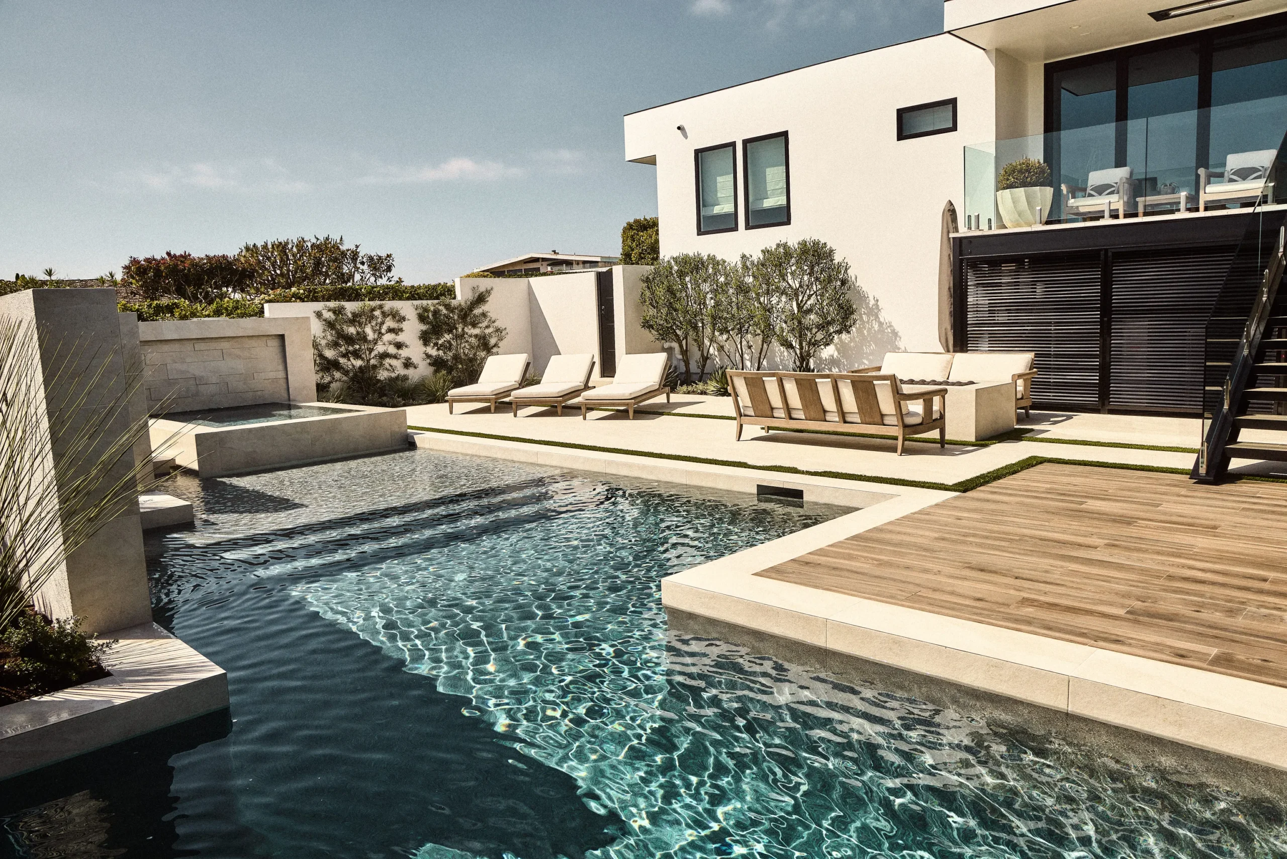 outdoor living and pool integration. Urban Landscape Maintenance Inc.