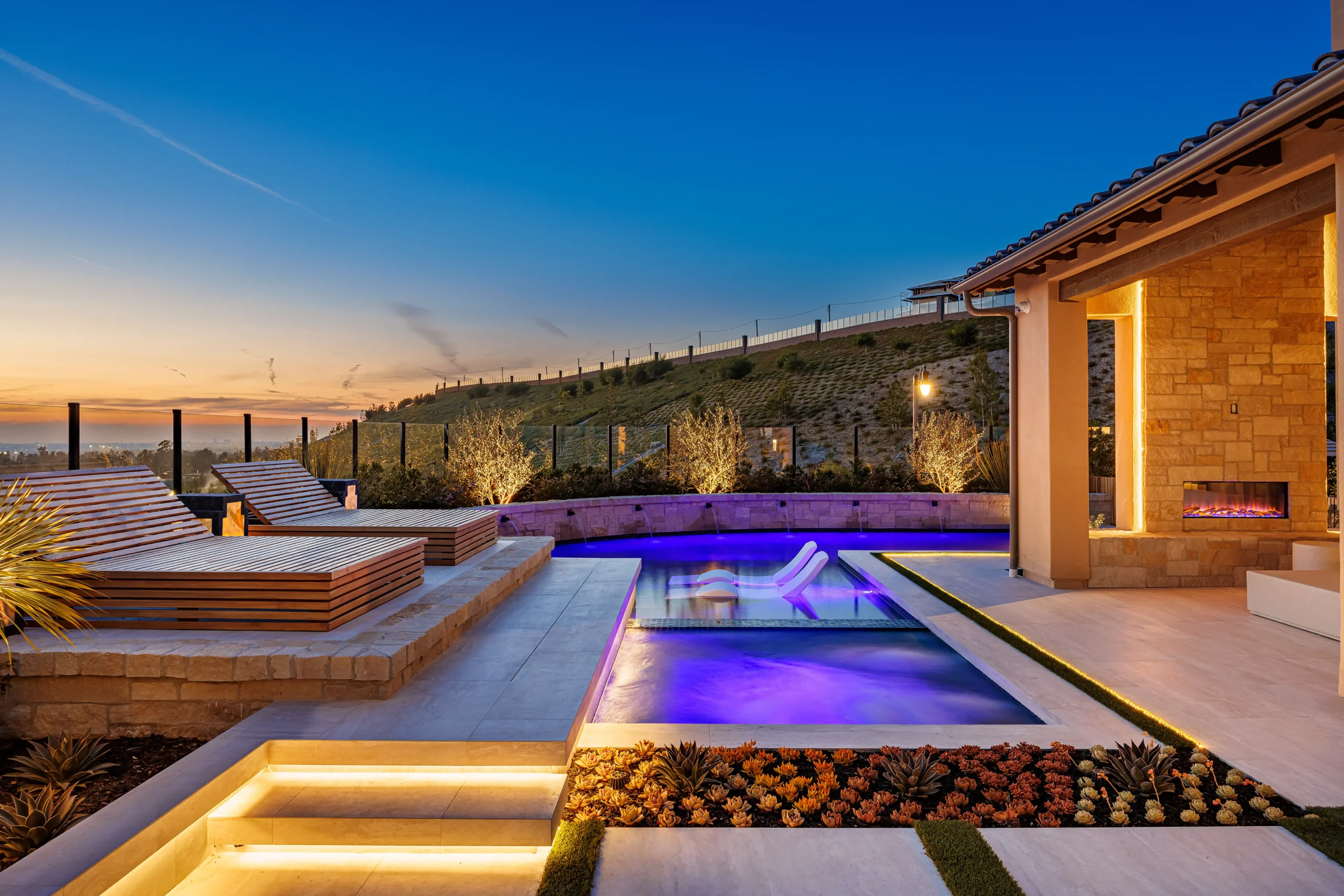 outdoor kitchen and pool combinations